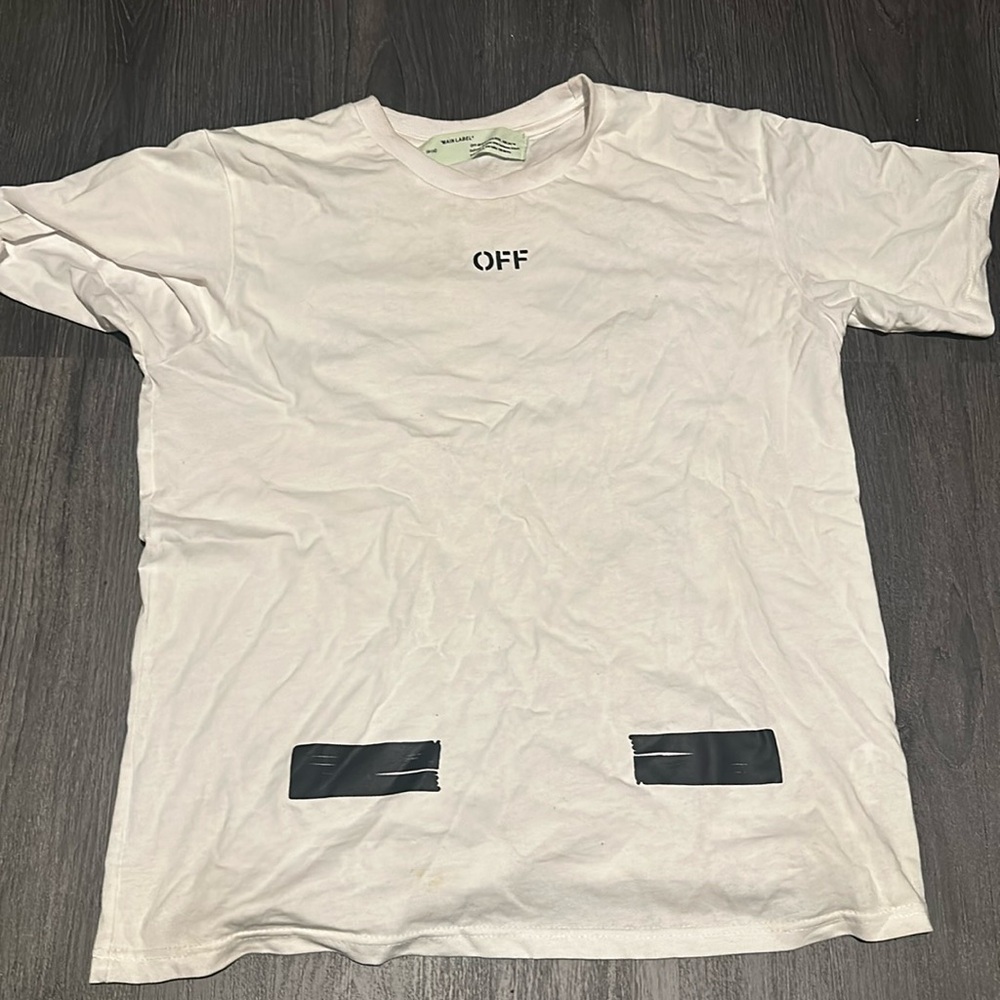 Gently worn off white shirt with a minor stain